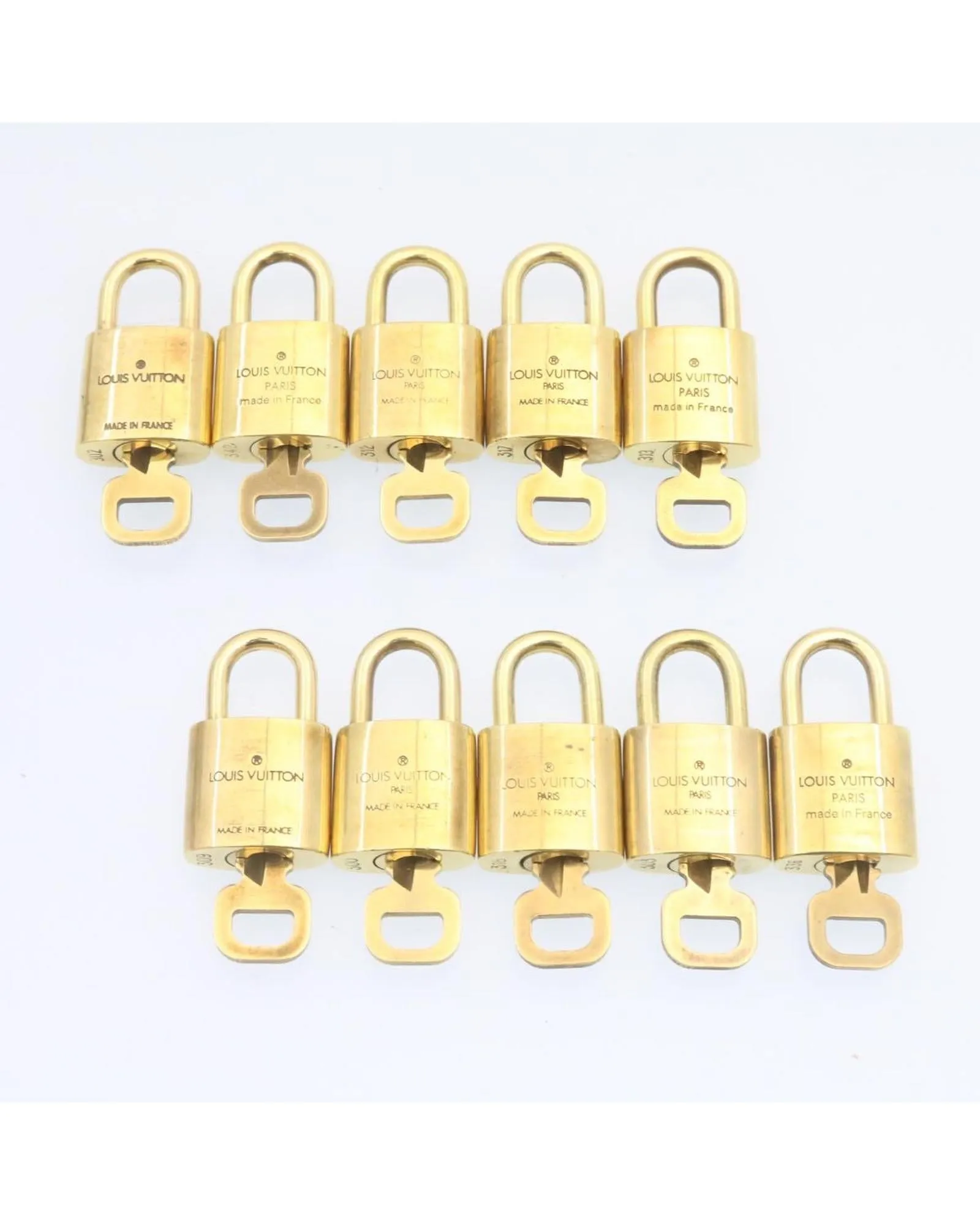 Authentic LOUIS VUITTON Gold Tone Padlock - Set of 10