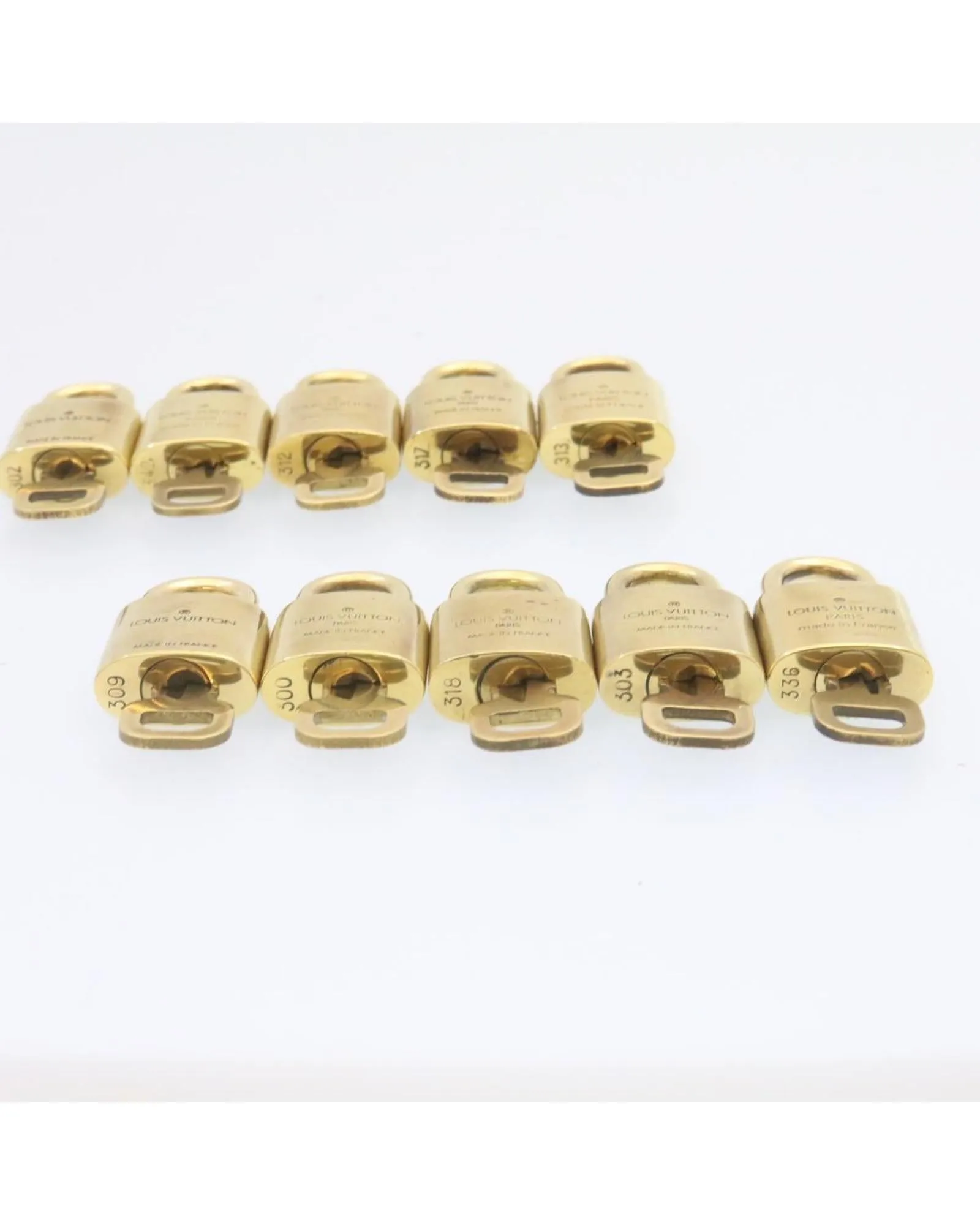 Authentic LOUIS VUITTON Gold Tone Padlock - Set of 10