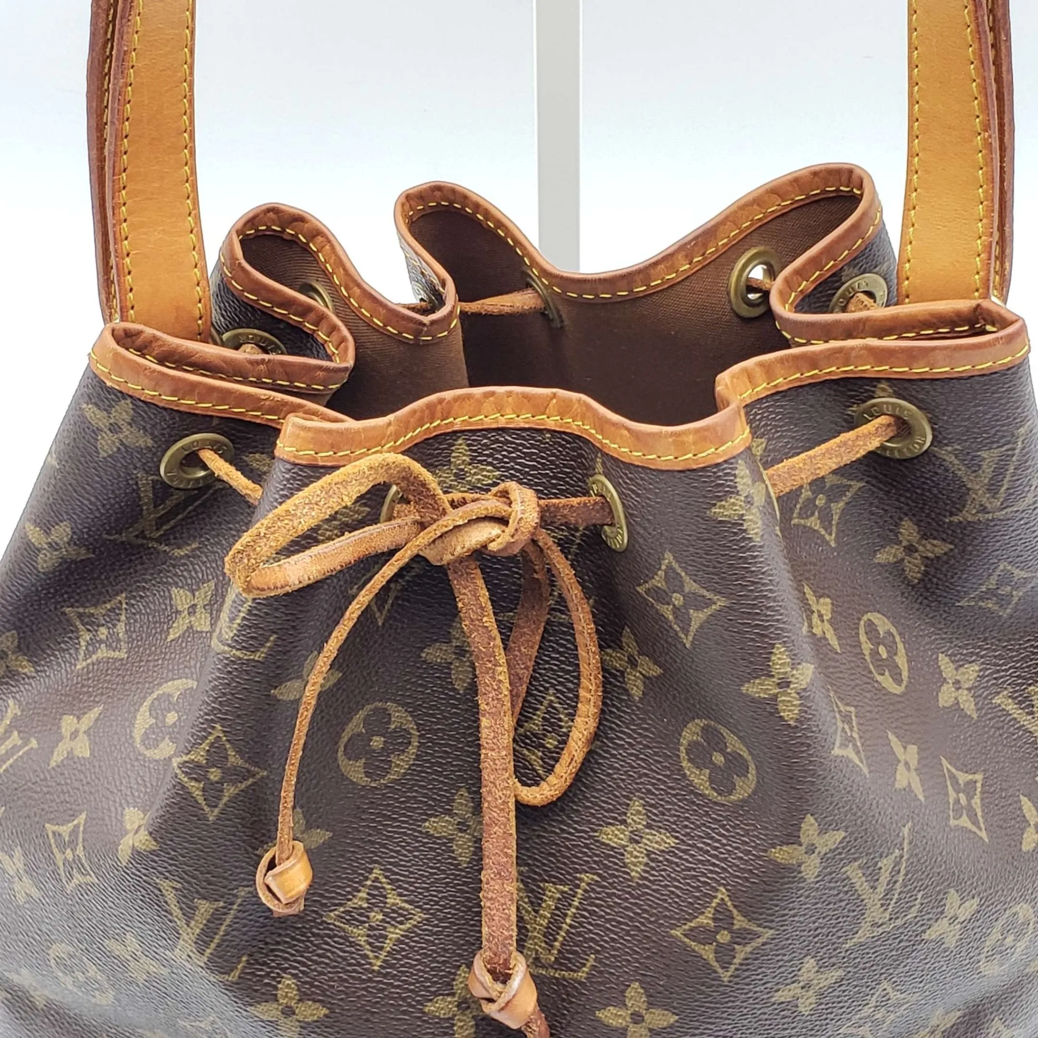 LOUIS VUITTON MONOGRAM PETIT NOE DRAWSTRING BAG