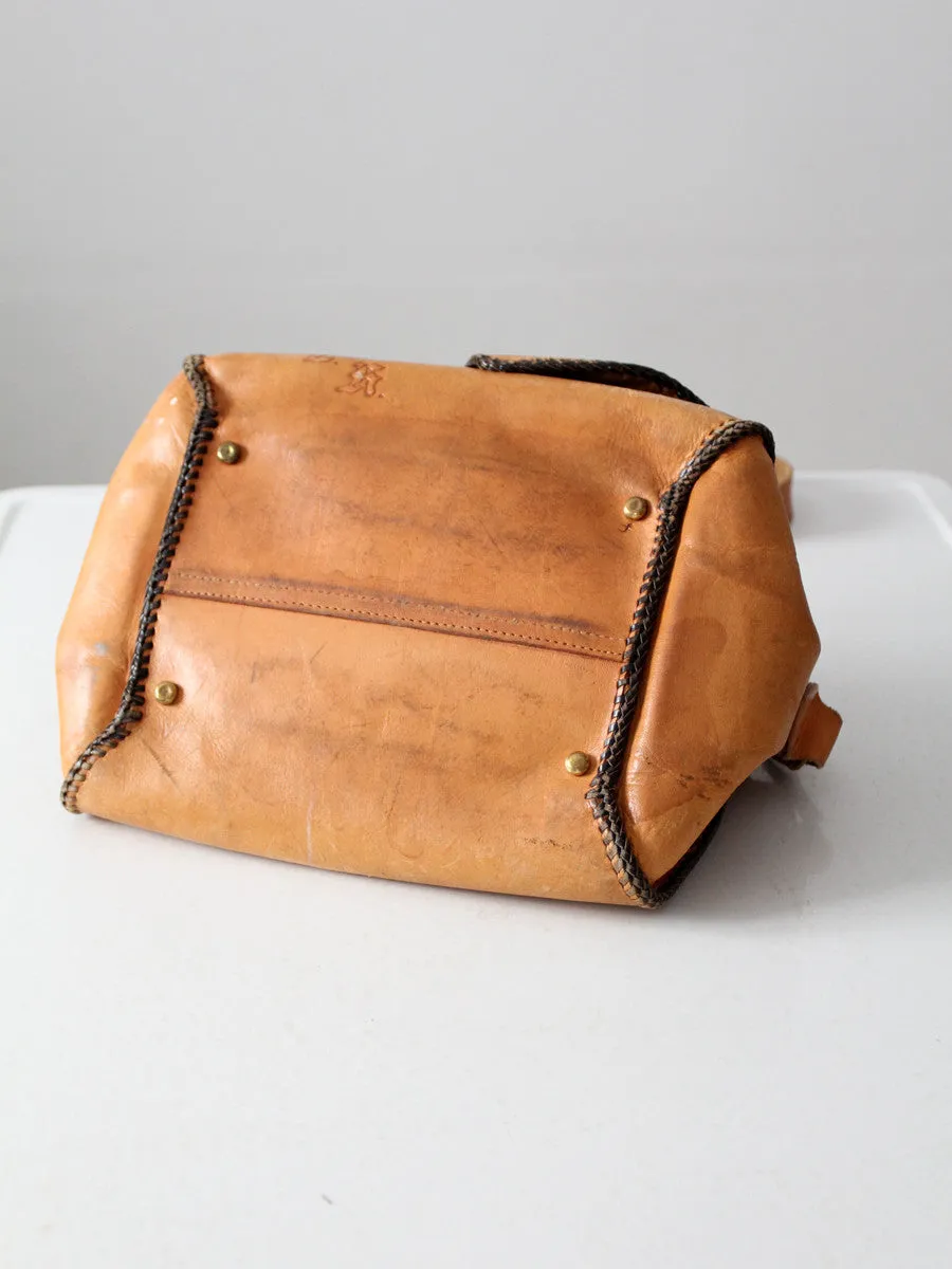 vintage 70s tooled leather satchel